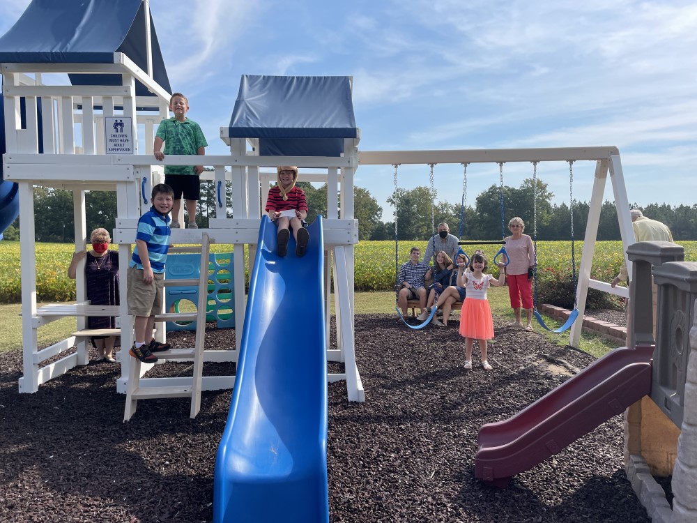 Members of Bott Memorial Church enjoy their new playground. 